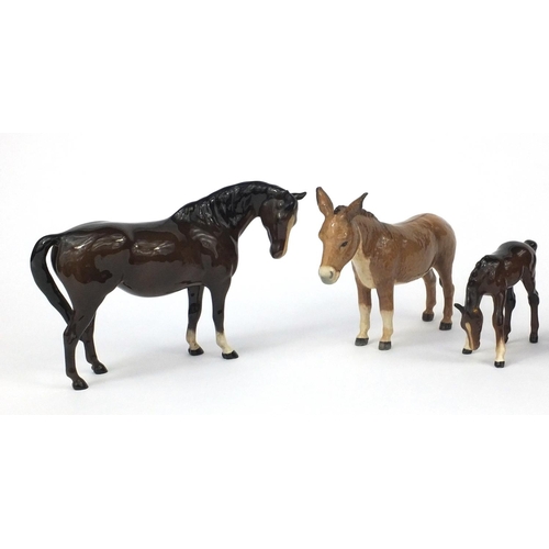 2118 - Group of Beswick animals including two horses, foul and two donkeys, the largest 15cm high