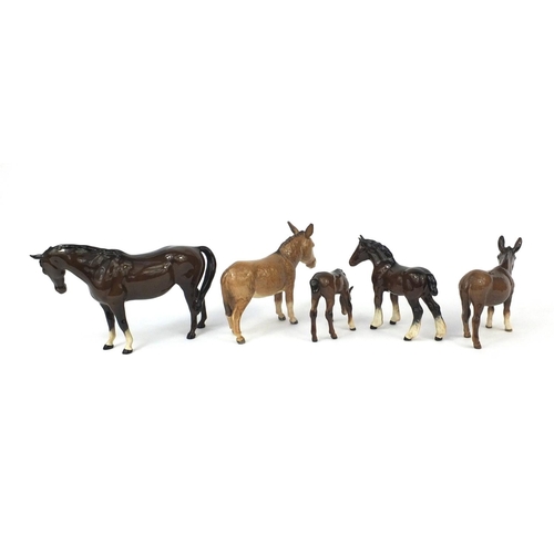 2118 - Group of Beswick animals including two horses, foul and two donkeys, the largest 15cm high