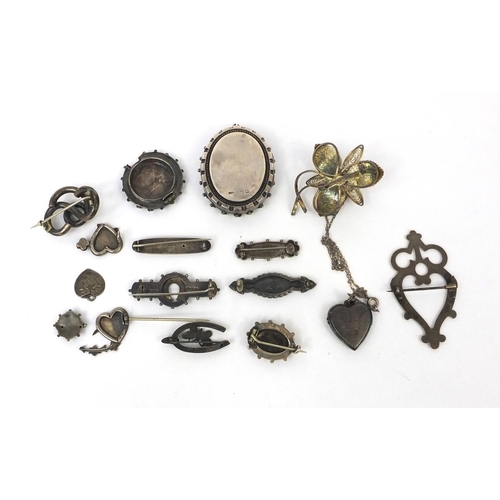 2603 - Selection of mostly silver jewellery including Victorian brooches, a large oval locket, enamelled br... 