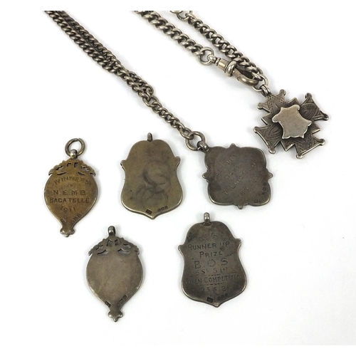 2635 - Six silver sports jewels and two silver watch chains, approximate weight 136.0g