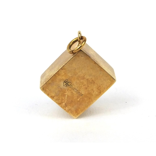 2648 - 9ct gold emergency one pound note charm, 1.5cm long, approximate weight 2.8g