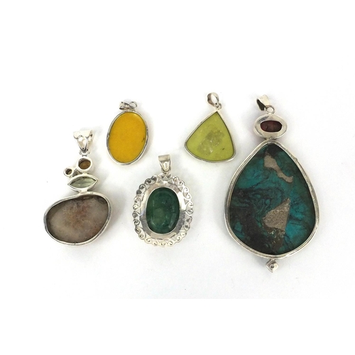 2573 - Five silver pendants set with assorted semi precious stones including turquoise and Mother of Pearl,... 