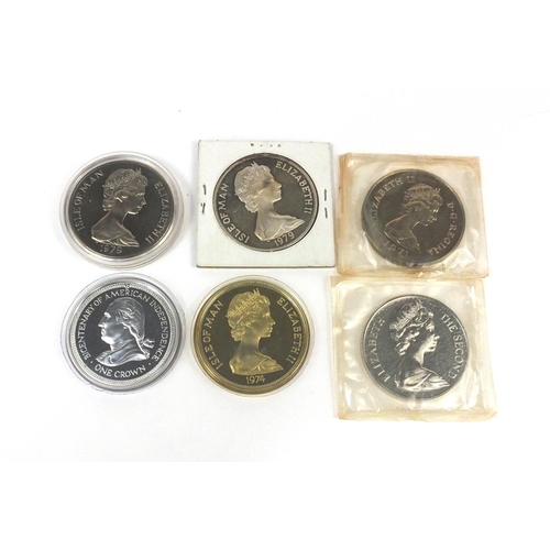 2748 - Six silver coins - four with fitted cases, including 1979 Isle of Man one crown, 1974 Isle of Man Wi... 