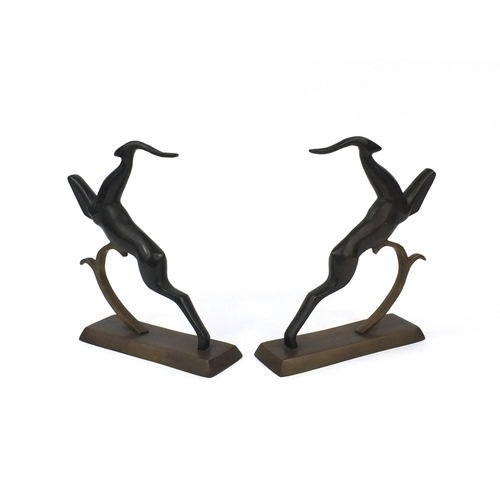 2365 - Pair of Art Deco style bronzed gazelle book ends, each 23.5cm high