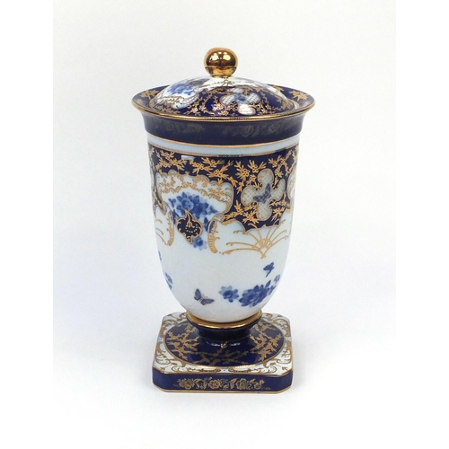 2088 - Large Roselle OCC & Co Staffordshire blue and white urn and cover with gilt floral decoration, facto... 