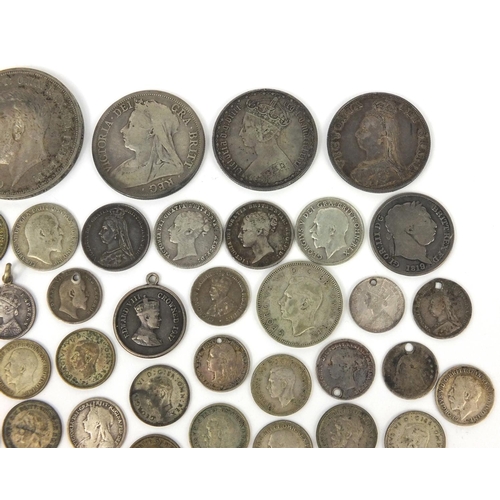 2775 - Group of British 19th century and later coinage, some silver, including 1881 Gothic florin, 1935 roc... 