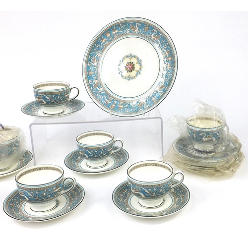 2240 - Wedgwood Florentine patterned six place tea service comprising six trios, milk jug, sugar bowl and a... 