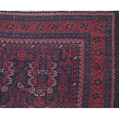 2041 - Rectangular Afshar carpet runner decorated with an all over floral and repeat pattern design, 220cm ... 