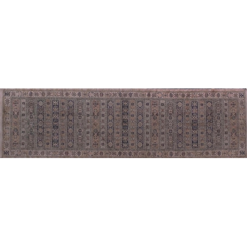 2071 - Rectangular Turkish silk carpet runner with an all over geometric design, 240cm x 67cm