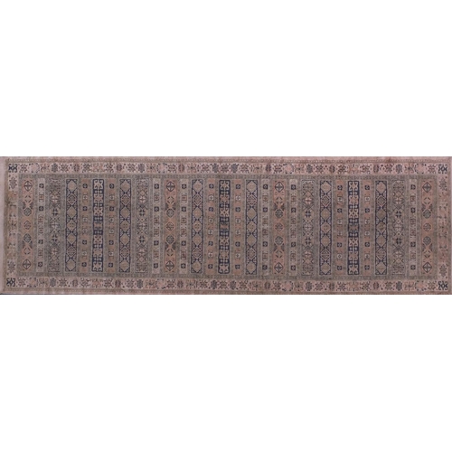 2071 - Rectangular Turkish silk carpet runner with an all over geometric design, 240cm x 67cm