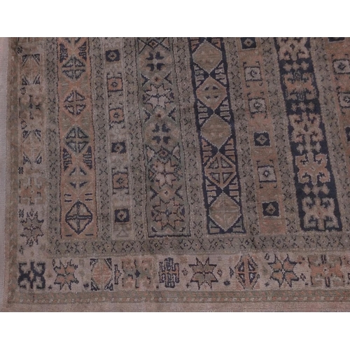 2071 - Rectangular Turkish silk carpet runner with an all over geometric design, 240cm x 67cm