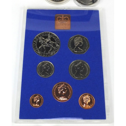 2764 - Group of uncirculated coin sets and four others including Royal Mint 2000 coin set, two £5 coins, Is... 