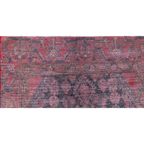 2080 - Rectangular Hamadan rug with an all over stylised floral design within two borders onto a predominan... 