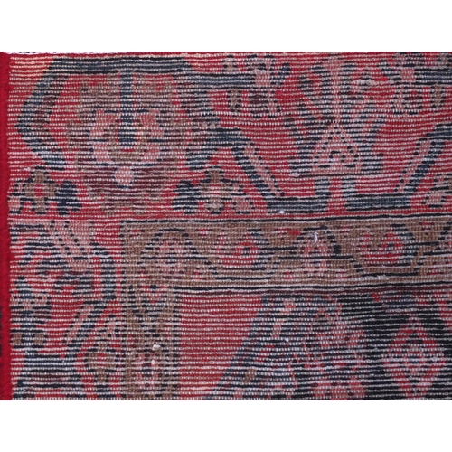 2080 - Rectangular Hamadan rug with an all over stylised floral design within two borders onto a predominan... 