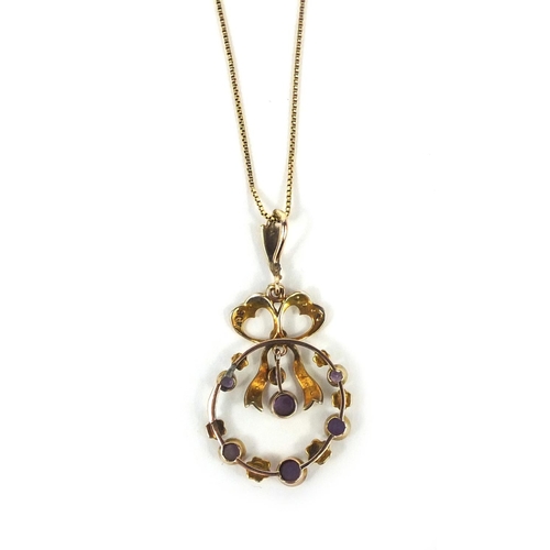 2528 - Edwardian 9ct gold amethyst and seed pearl pendant on a 10ct gold necklace, the pendant 4.5cm long, ... 