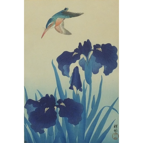 590 - Two Japanese wood block prints, one of a bird in flight, both with seal marks, each mounted and fram... 