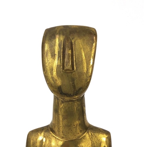 2260 - Brass modernist sculpture of a figure raised on a square Perspex base, 25cm high