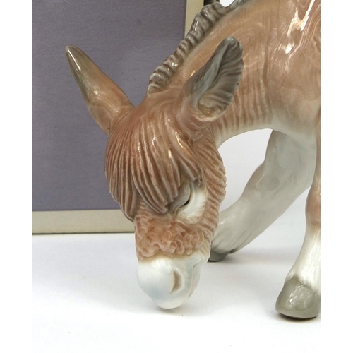 2133 - Lladro model of a donkey, factory marks to the base with box, 19cm in length