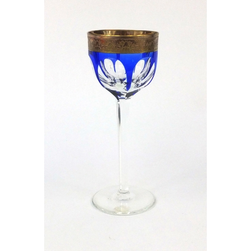 734 - Moser blue flashed Lady Hamilton wine glass, the rim with floral chase decoration, acid etched facto... 