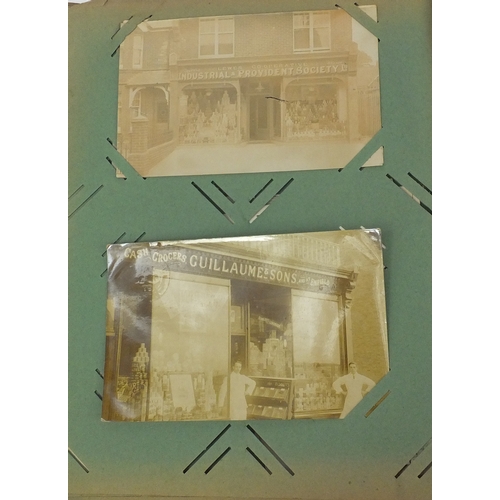 200 - Album of postcards including shop fronts, street scenes, some Military and some topographical exampl... 