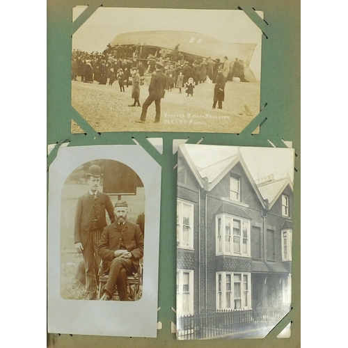 200 - Album of postcards including shop fronts, street scenes, some Military and some topographical exampl... 