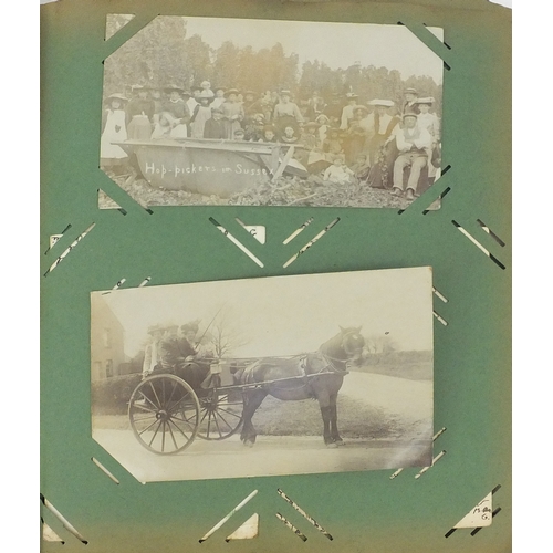 200 - Album of postcards including shop fronts, street scenes, some Military and some topographical exampl... 