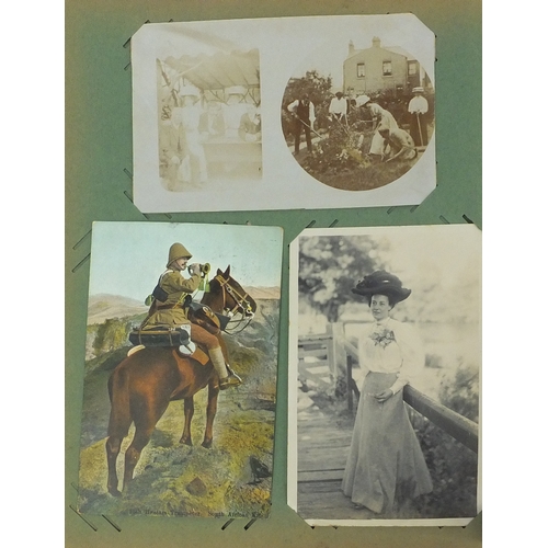 200 - Album of postcards including shop fronts, street scenes, some Military and some topographical exampl... 