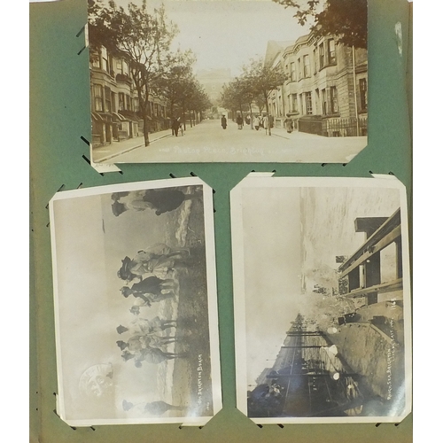 200 - Album of postcards including shop fronts, street scenes, some Military and some topographical exampl... 