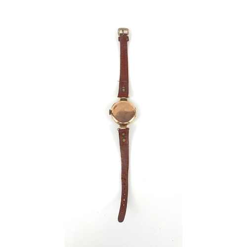 2623 - 9ct gold vintage ladies wristwatch with brown leather, 2.5cm in diameter