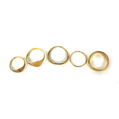 2560 - Five 9ct gold rings including wedding bands and signet rings, various sizes, approximate weight 7.0g