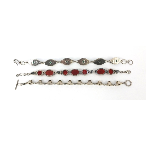 2685 - Three silver bracelets set with semi precious stones including tigers eye and cornelian, each 19cm l... 