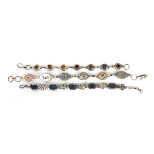 2539 - Three silver bracelets set with semi precious stones comprising tigers eye, quartz and Lapis Lazuli,... 