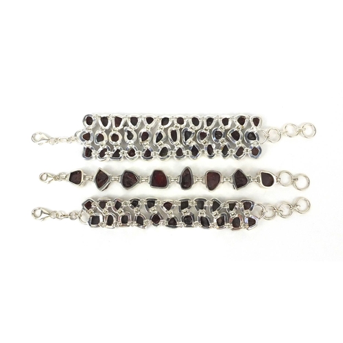 2606 - Three silver bracelets set with natural semi precious stones, each 19cm long, approximate weight 147... 