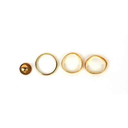 2504 - Two 22ct gold wedding bands, a 9ct gold wedding band and 15ct gold stud, approximate weight 7.0g