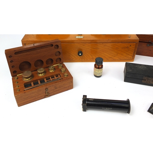 58 - Scientific instruments and equipment including a cased Beck of London microscope model 10, J H Stewa... 