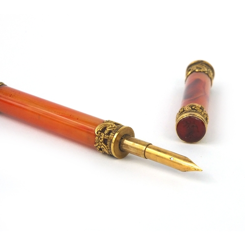 118 - 19th century agate dip pen, with floral gold mounts and seal top end, the seal top end intaglio moul... 