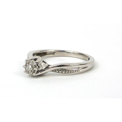 2624 - Silver diamond crossover ring, size L, approximate weight 2.2g