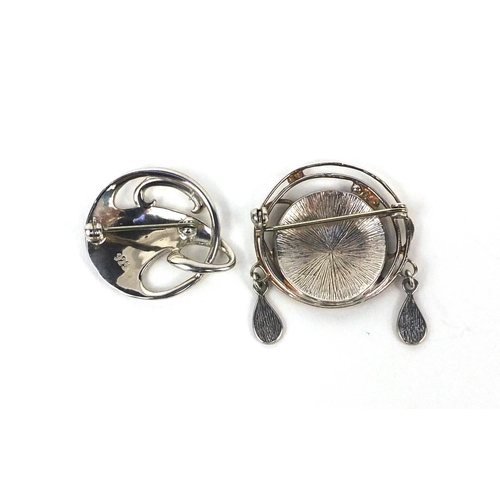 2527 - Two Art Nouveau style silver and enamel brooches, the largest 3cm in diameter, approximate weight  1... 