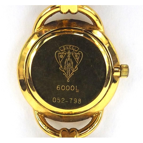 2678 - Ladies Gucci quartz wristwatch numbered 052-798 to the case, 2.2cm in diameter