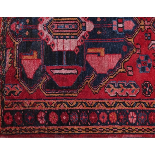 2086 - Rectangular Azerbaijan carpet runner with an all over geometric floral design within a floral border... 