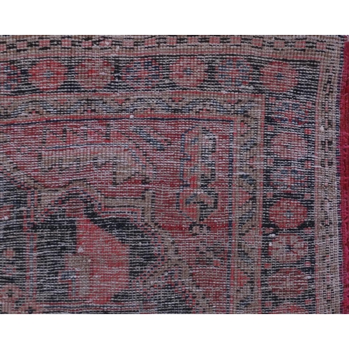 2086 - Rectangular Azerbaijan carpet runner with an all over geometric floral design within a floral border... 