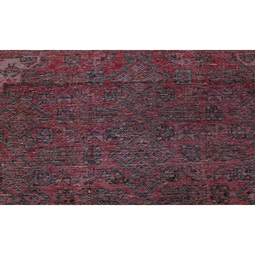 2083 - Rectangular Hamadan rug with an all over floral and animal decoration, 220cm x 133cm