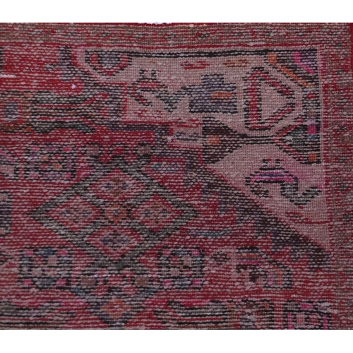 2083 - Rectangular Hamadan rug with an all over floral and animal decoration, 220cm x 133cm