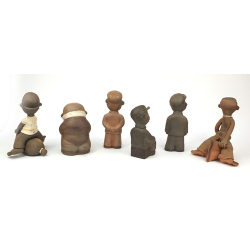 2316 - Six comical Chinese terracotta figure three in uniform, two riding a pillows and one playing an musi... 