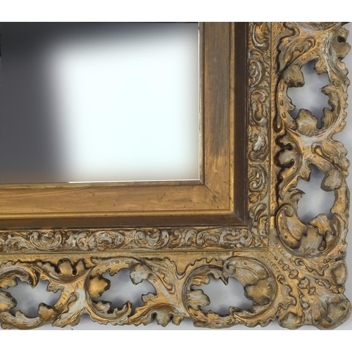 16 - Cream and gilt ornate framed mirror, 90cm x 79cm