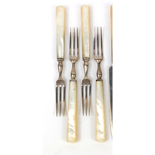 2413 - Set of four silver and mother of pearl fruit knives and forks, TL Sheffield 1910