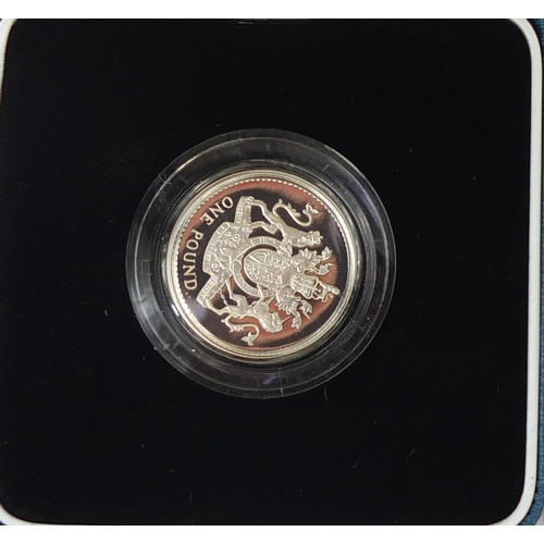 2736 - Three 1993 United Kingdom silver proof £1 coins, each with fitted cases and certificates