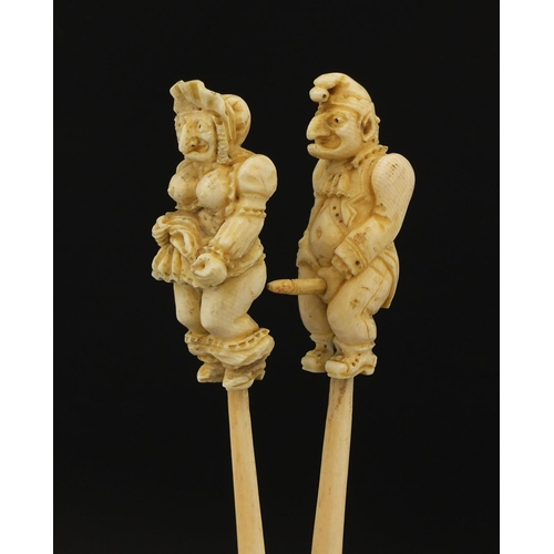 2393 - * WITHDRAWN FROM SALE * Bone handled erotic Punch and Judy figures, 24cm in length