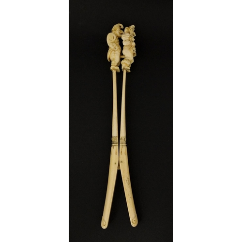 2393 - * WITHDRAWN FROM SALE * Bone handled erotic Punch and Judy figures, 24cm in length