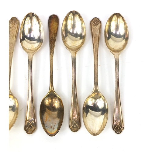 2466 - Set of six Mappin & Webb silver teaspoons with golfing interest terminals, and a pair of  unassociat... 